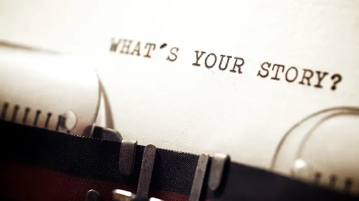 ark i gammel skrivemaskin hvor det står hva er din historie