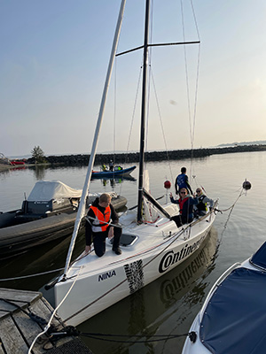 photo of participants on a sail boat