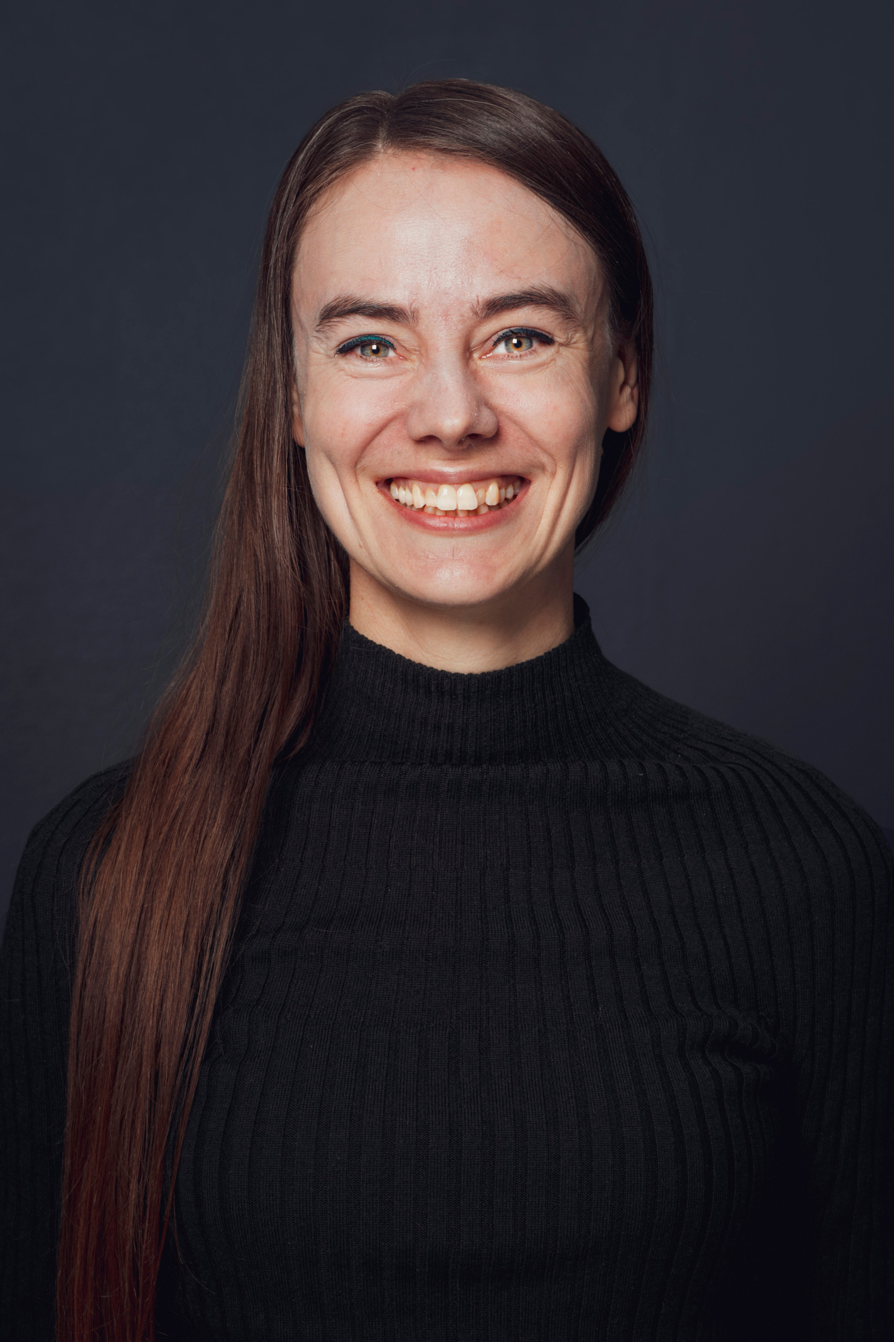 Profile photo of Marieke smiling wearing a black jumper